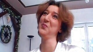 A super hot lady from Germany tickling her pussy with her dildo