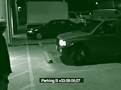Babe is on knees sucking cock in the parking place in xxx