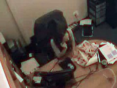 Brunette dildo fucks pussy in the office chair in vid