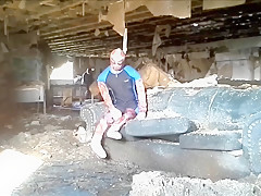 frogman captures his spandex enemy in abandoned building
