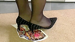 Girl stomping on paper in high heels, 3 high heels crush trample picture