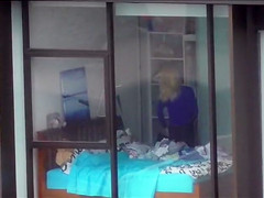 My lovely neighbor Alena changes her tight clothes in the bedroom