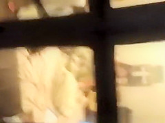 Window spies neighbor in her bedroom
